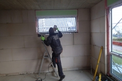 Ovrier de Norta pendant le travail