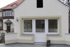 maison avec les menuiseries à petits carreaux